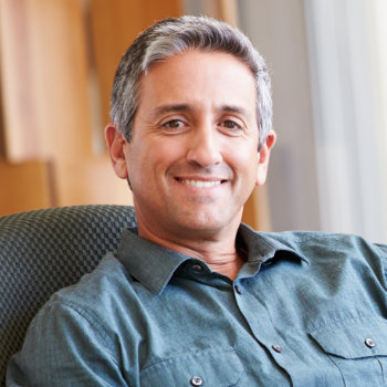 Cheerful mature Spanish man portrait Dunwoody Dental Health