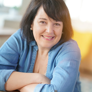 Mature brunette woman smiling Dunwoody Dental Health care