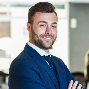 Smiling handsome businessman Dunwoody Dental Health patient