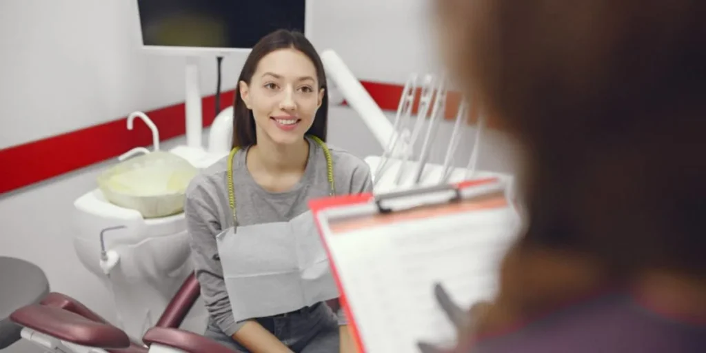 Cost-Effective Dental Membership Plans for Patients Without Insurance in Dunwoody, GAΒ 5 Patient learning about Dental Membership Plans options